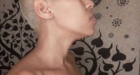 GoldenLace shows off her throat fetish and shaved-headed skills in multiple videos