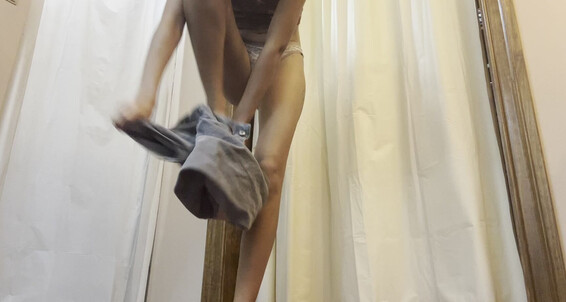 AriaNicoleXXX publicly pees in a dressing room with a smile