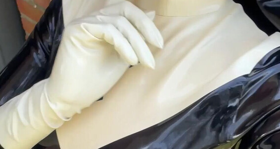 Watch FetiliciousFans tease in latex outfits & pose outdoors in public