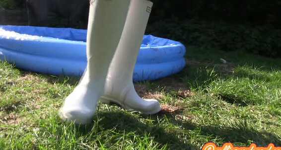 Jess West gets wild in the pool in her wellies and manyvids