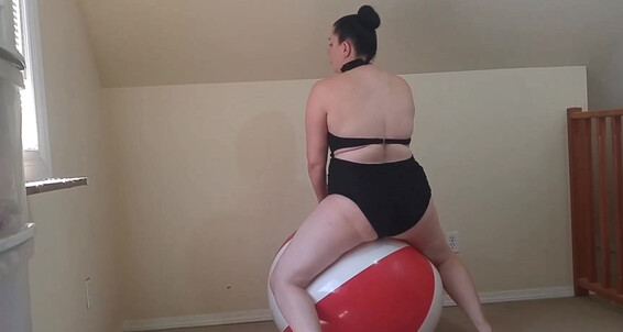 Booty U Black Bathingsuit And Big Beach Ball